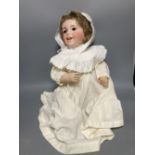 A French SFBJ bisque-headed doll, mould 236 with sleeping eyes and closed mouth, bent-limb