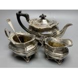A George V silver bachelor's three piece tea set, Josiah Williams & Co, London, 1913 and a silver