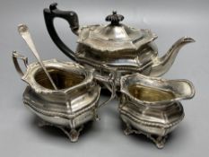 A George V silver bachelor's three piece tea set, Josiah Williams & Co, London, 1913 and a silver