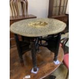 A Benares brass tray top table, 78cm diameter, 62cm high