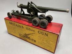 A Britain's 155mm gun, with shell case, loader and six shells supplied, boxed, 30cm long