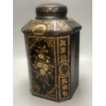 A 19th century toleware octagonal tea canister, J. Newman, Dublin, painted with flowers and