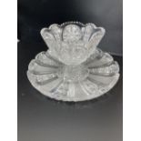 An American or Bohemian brilliant cut glass pedestal bowl and large dish, late 19th century, dish