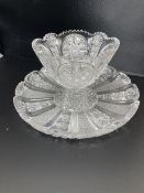 An American or Bohemian brilliant cut glass pedestal bowl and large dish, late 19th century, dish