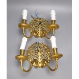 A pair of gilt brass twin-light wall sconces, height 22cm