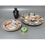 Two Japanese plates, a cloisonne vase and a seal paste box, largest 24.5cm