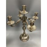 An early 20th century continental 830 white metal four branch, five light candelabrum, height 47.