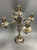 An early 20th century continental 830 white metal four branch, five light candelabrum, height 47.