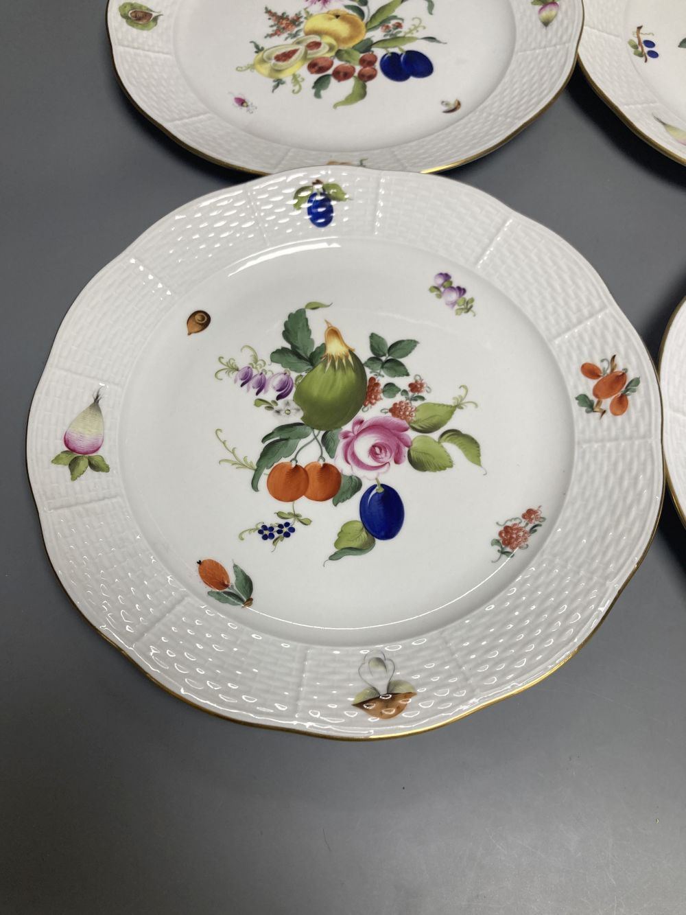 A set of four Herend Meissen style floral painted dessert dishes, diameter 25.5cm - Image 3 of 5