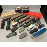 A collection of 00 gauge locomotives, wagons and coaches to include Hornby and Triang
