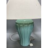 A pair of celadon glazed table lamps, with shades, overall height 63cm