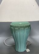 A pair of celadon glazed table lamps, with shades, overall height 63cm