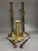 An 18th century French ormolu candlestick, 25cm, a pair of 19th century tubular brass ejector