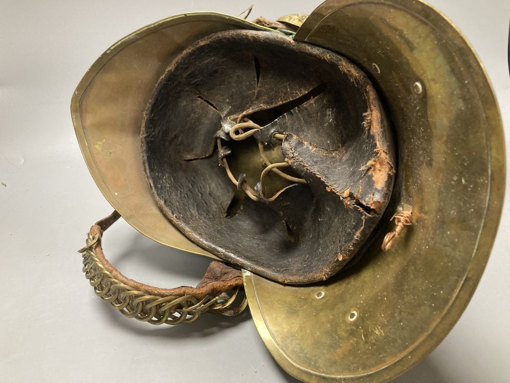 An early 20th century brass fireman's helmet, 17cm - Image 3 of 4