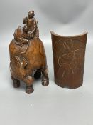 A Chinese bamboo group of figures on an ox and a wrist rest, 23 and 17cm