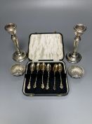 A pair of modern silver candlesticks, 15.6cm, weighted, a pair of George V silver shell salts and
