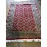 A Pakistan Persian pattern rug, red ground, 237 x 153cm