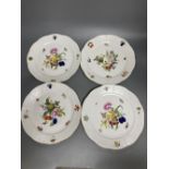 A set of four Herend Meissen style floral painted dessert dishes, diameter 25.5cm