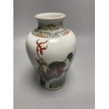 A Chinese famille verte vase, decorated with dragons, height 20cm