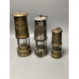 Three brass and chrome miner's lamps, 25cm high