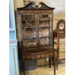 An Edwardian marquetry inlaid mahogany bow front display cabinet, width 92cm, depth 47cm, height