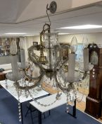 A pair of five branch Venetian glass chandeliers, each with cut lustre drops and another similar