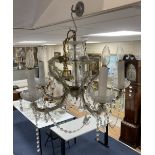 A pair of five branch Venetian glass chandeliers, each with cut lustre drops and another similar
