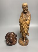 Two Oriental figural wood carvings, tallest 31cm