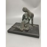 A contemporary bronze figure of a seated female figure, ebonised plinth 29.5cm wide