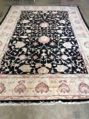 A Ziegler style black ground carpet, 380 x 270cm