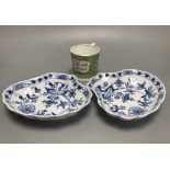 Two Meissen onion pattern shell-shaped dishes, width 19cm, and an English porcelain cabinet cup,