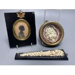 A Cantonese carved ivory basket of flowers, framed, Dieppe carved ivory applique panel and a