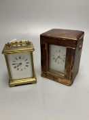 A gilt-brass carriage timepiece, with white enamelled Roman dial and outer travelling case and