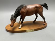 A Royal Doulton figure, 'Spirit of Nature', length 29cm (front left hoof loose)