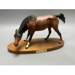 A Royal Doulton figure, 'Spirit of Nature', length 29cm (front left hoof loose)