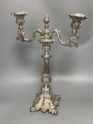 A silver plated twin light candelabrum, rococo style, hollow construction, 41cm high