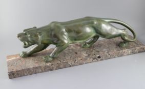 Brault. An Art Deco patinated bronze model of a prowling panther, with light green brown patination,