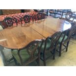 A set of seven George III style mahogany dining chairs (one with arms) together with a mahogany twin