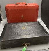 An antique parliamentary red leather despatch box and one other black box