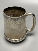 A Victorian engraved silver mug, William Hunter, London, 1876, 11.8cm, 9oz.CONDITION: The gauge of