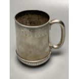A Victorian engraved silver mug, William Hunter, London, 1876, 11.8cm, 9oz.CONDITION: The gauge of