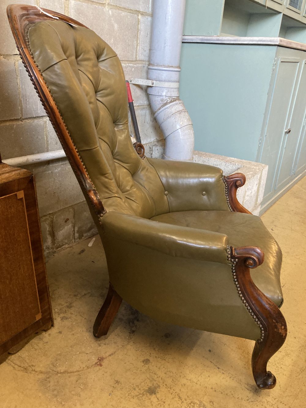 A Victorian carved and moulded showood frame spoonback armchair on scrolled legs, upholstered in - Image 3 of 3