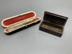 A 19th century papier mache faux tortoiseshell snuff box and a tortoiseshell case containing lace