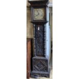 A 19th century carved oak 30-hour longcase clock, Thomas Templer, London, having silvered Roman