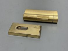 A gold plated Dunhill lighter no. A50077 and a German Dominus cigar cutter