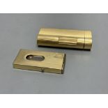 A gold plated Dunhill lighter no. A50077 and a German Dominus cigar cutter