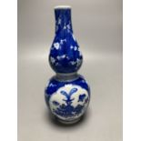 A Chinese blue and white double gourd vase, height 25cm