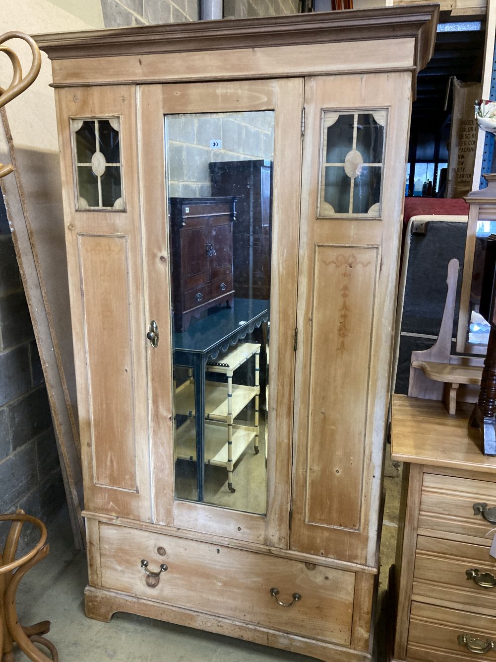 An Edwardian pine mirrored wardrobe, width 110cm, depth 54cm, height 198cm, together with a late