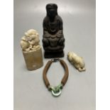 A group of Chinese Works of Art, jades, soapstones, a wooden Buddha and a jade and hair bracelet,
