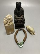 A group of Chinese Works of Art, jades, soapstones, a wooden Buddha and a jade and hair bracelet,